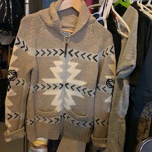 TNA wool sweater fits like a medium